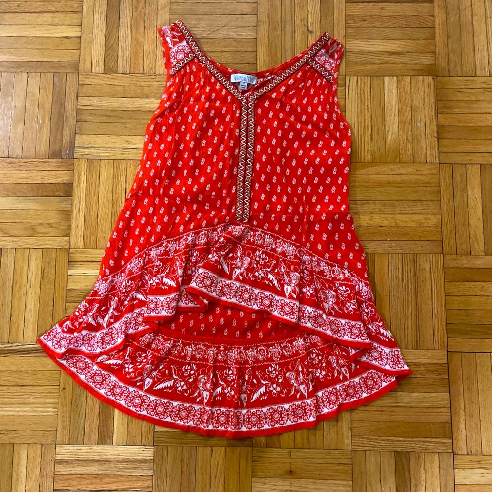 Patterned and beautifully beaded top!